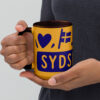 white-ceramic-mug-with-color-inside-golden-yellow-15-oz-left-6a06ea0f68155.jpg Sydslesvig in vier Symbolen – Keramiktasse