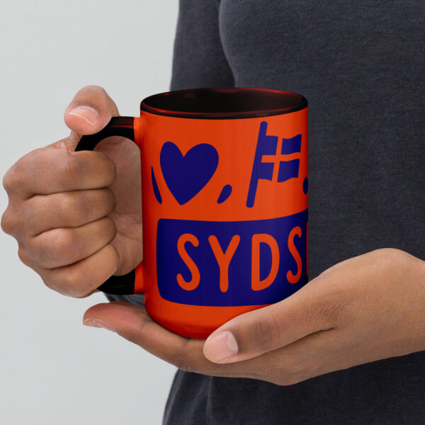 white-ceramic-mug-with-color-inside-orange-15-oz-left-6a06ea0f681df.jpg Sydslesvig in vier Symbolen – Keramiktasse
